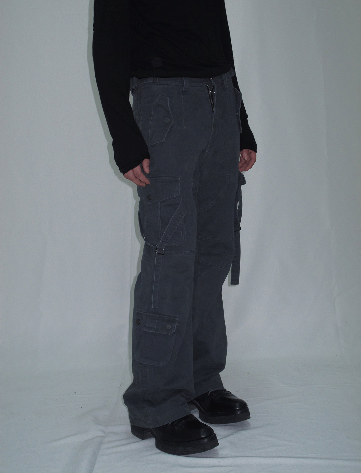 Cargo pants with multi-pocket straps