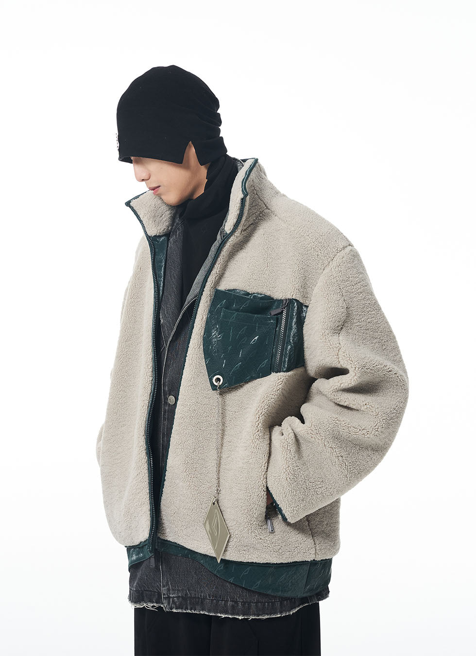 Sherpa jacket with removable metal label