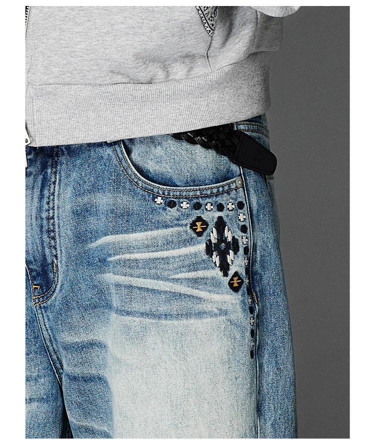 Embroidered washed jeans