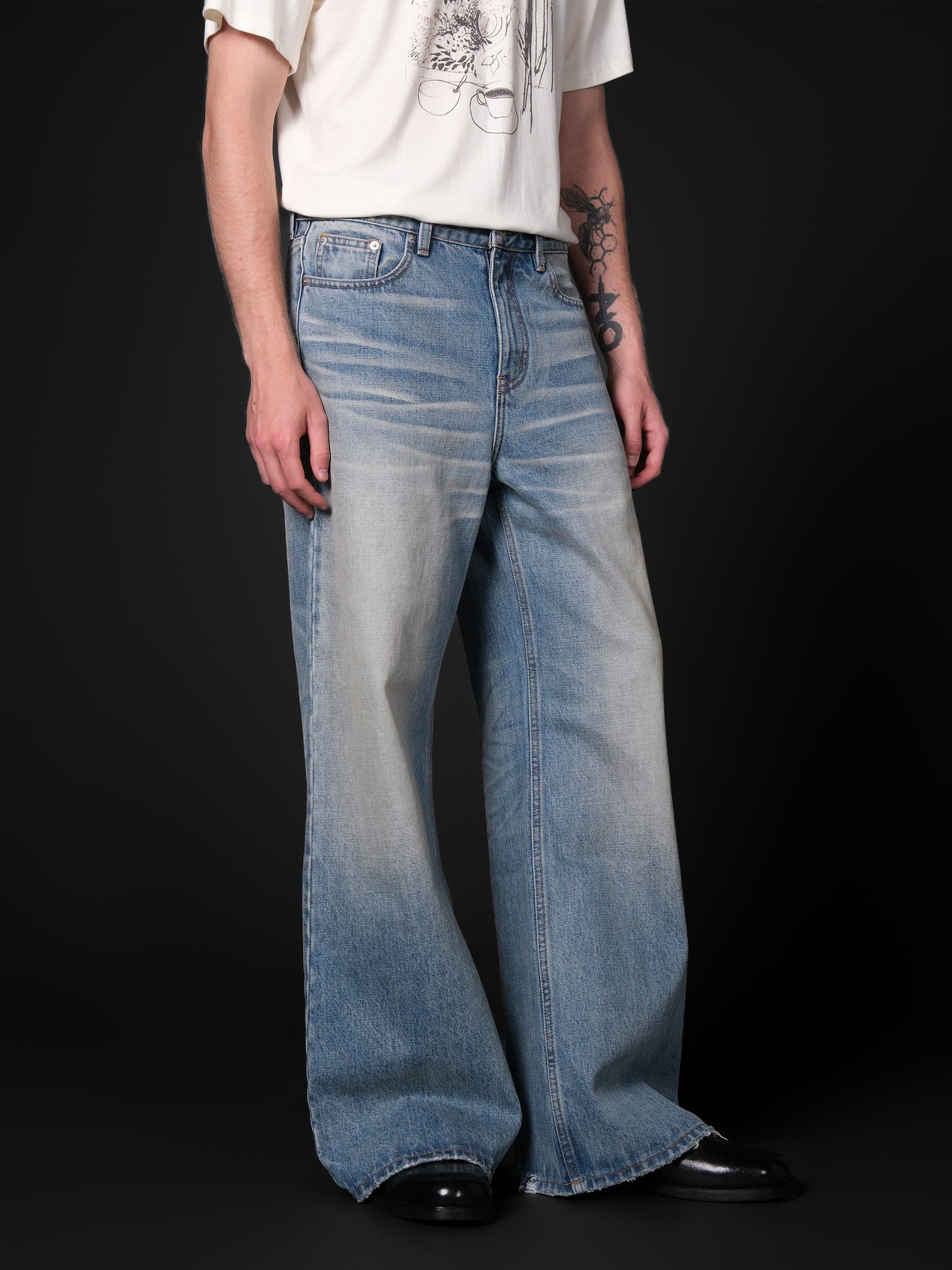 Distressed A-line jeans