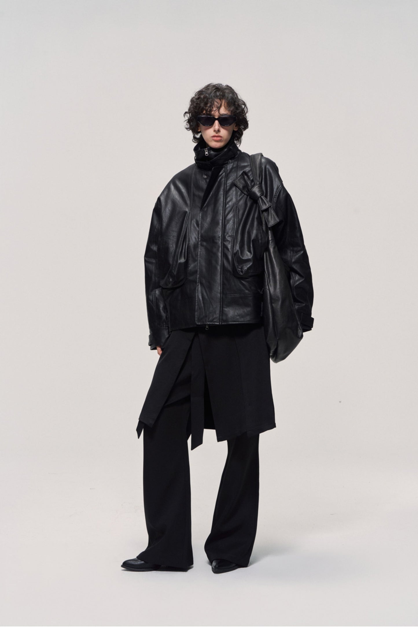 Damaged mid-length leather jacket