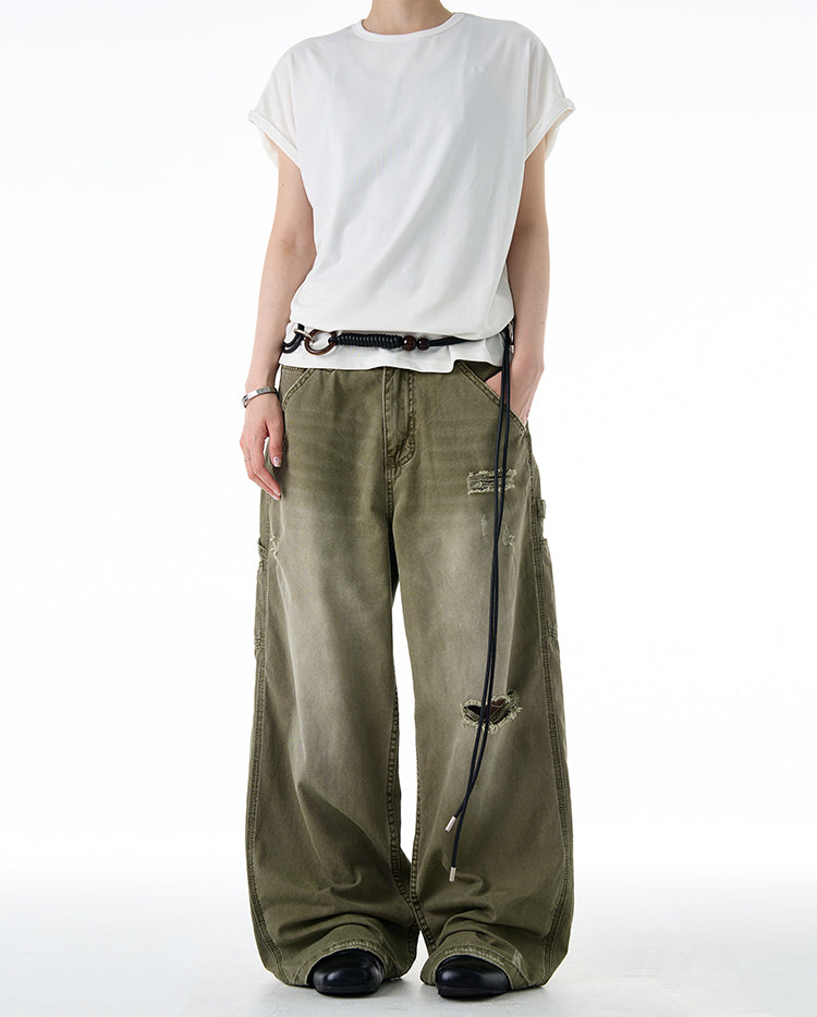 Damaged wash gradient jeans