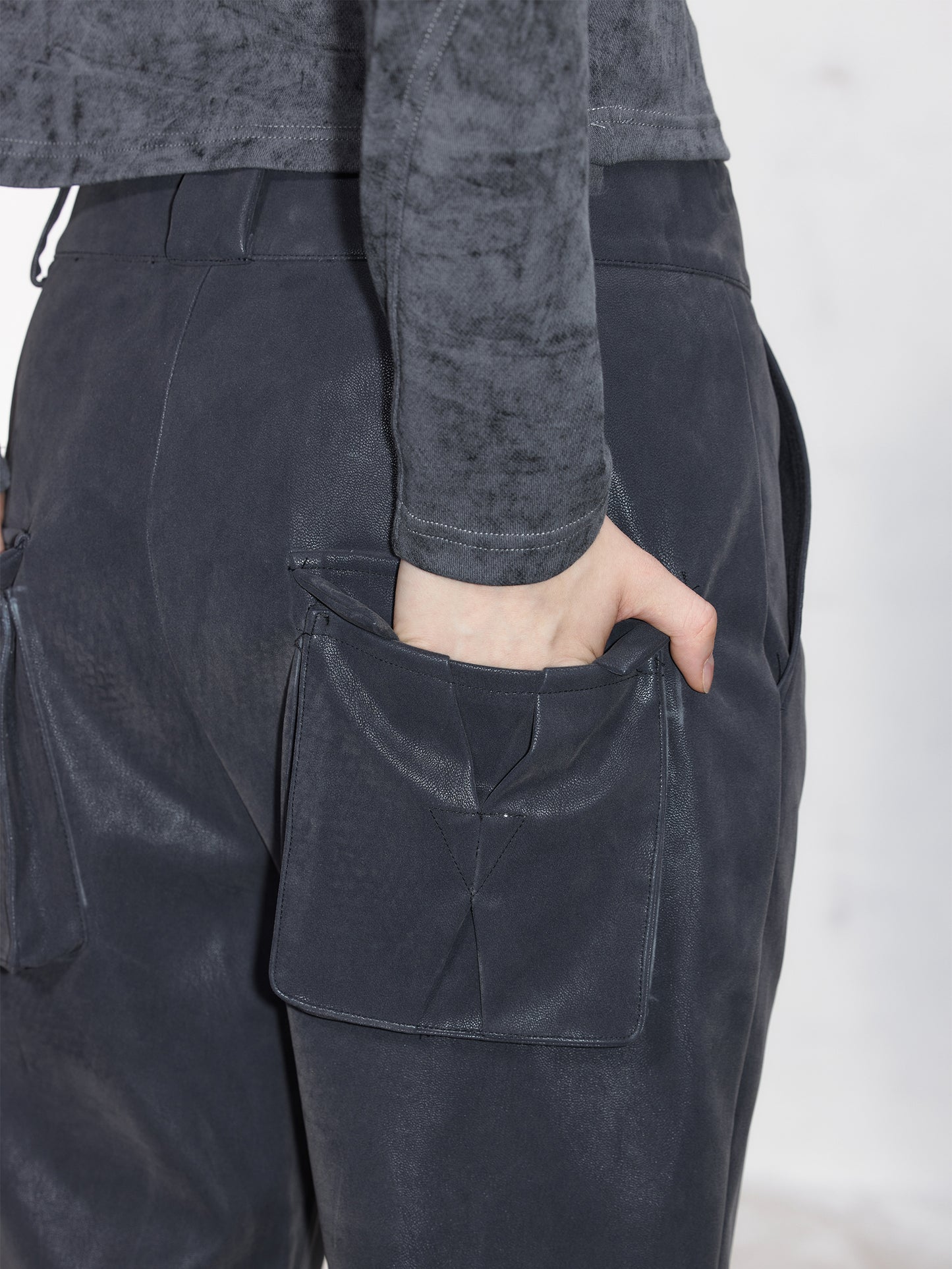 Embossed 3D pockets Flared leather pants