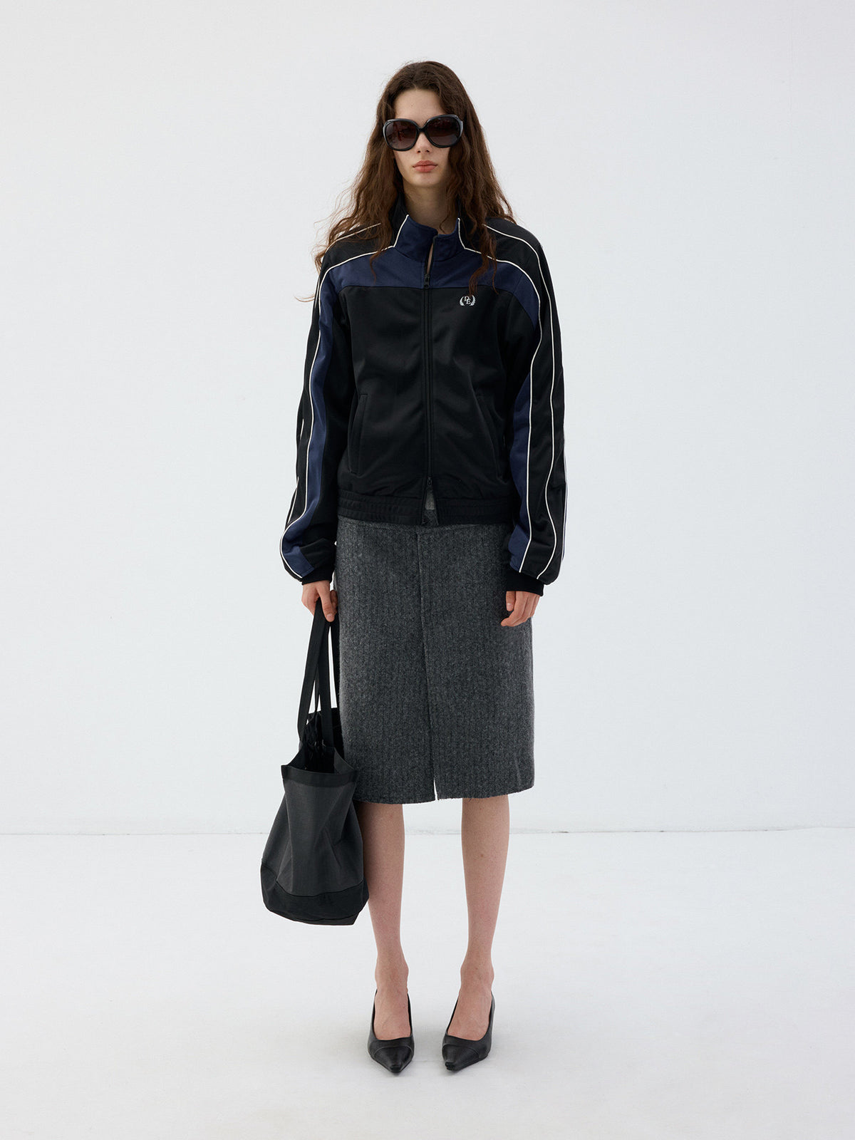 Jacket with a stand-up collar and a zipper