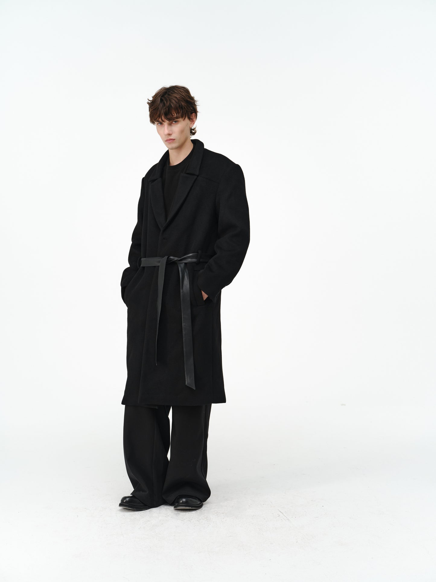 Overcoat with a leather belt