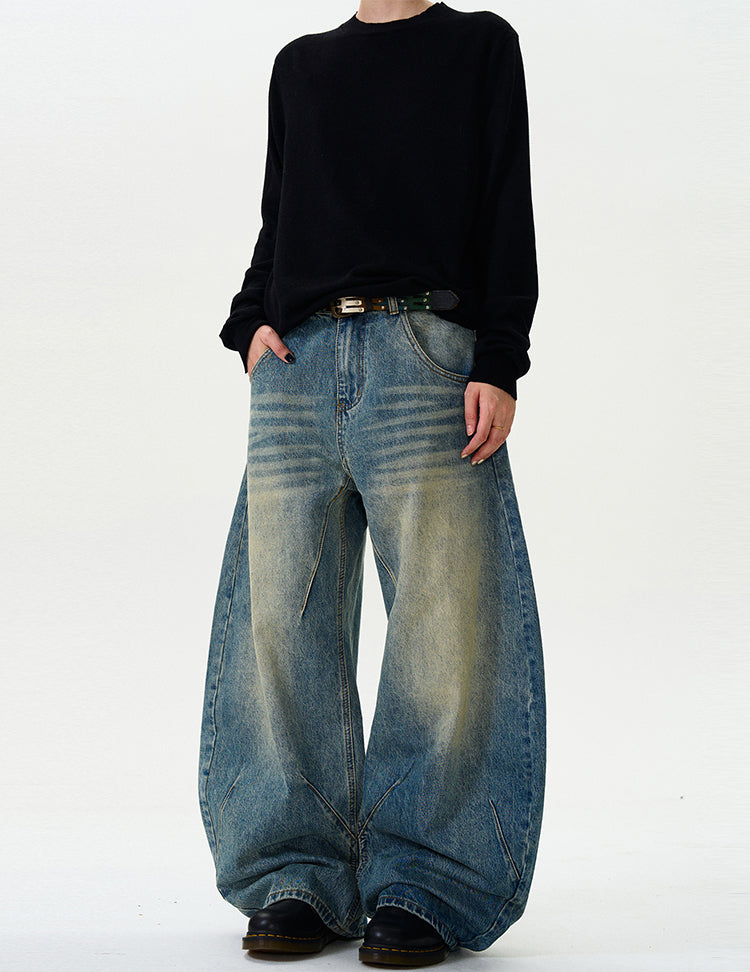 Retro three-dimensional cut-wash scimitar jeans