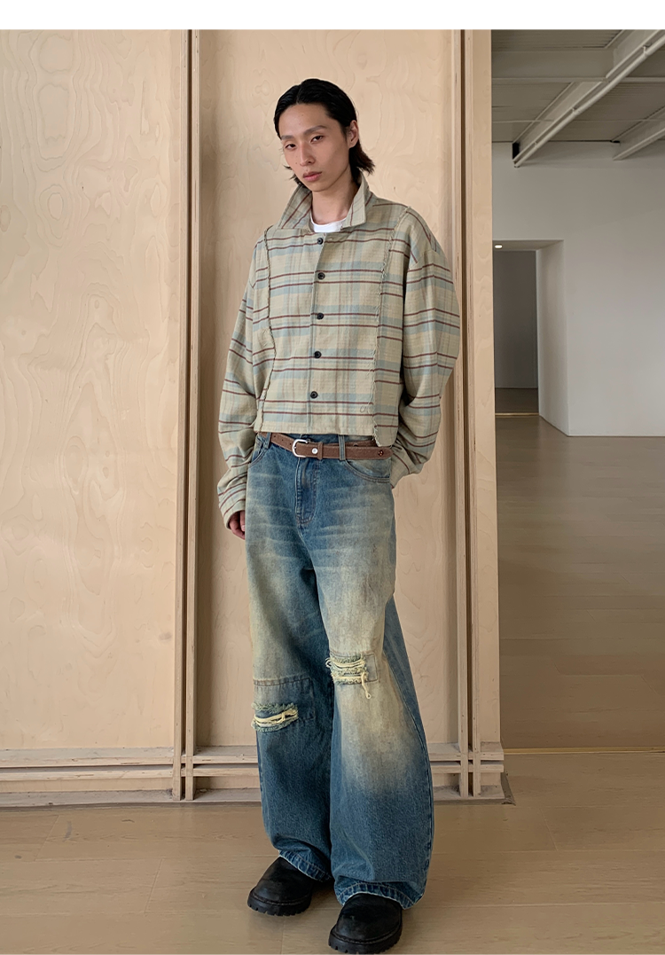 Mud-dyed wide-leg jeans