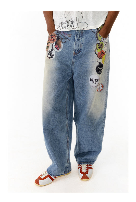 Medal print denim pants