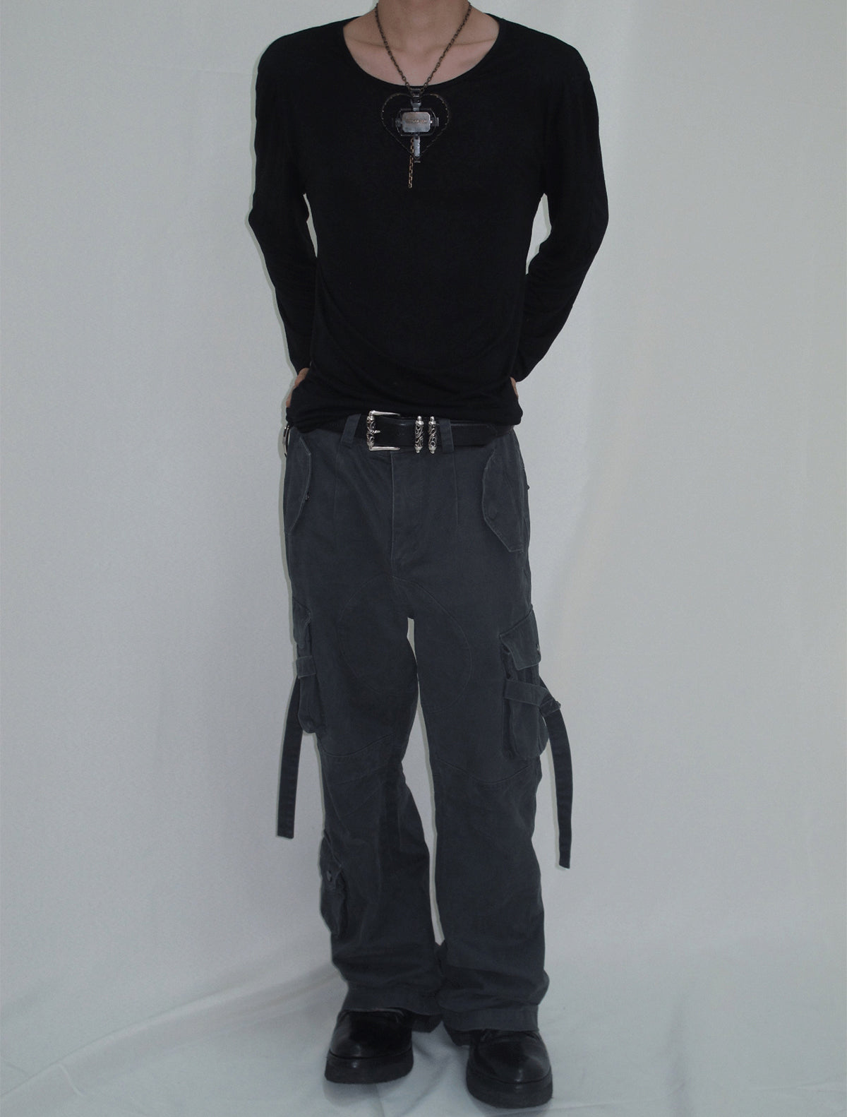 Cargo pants with multi-pocket straps