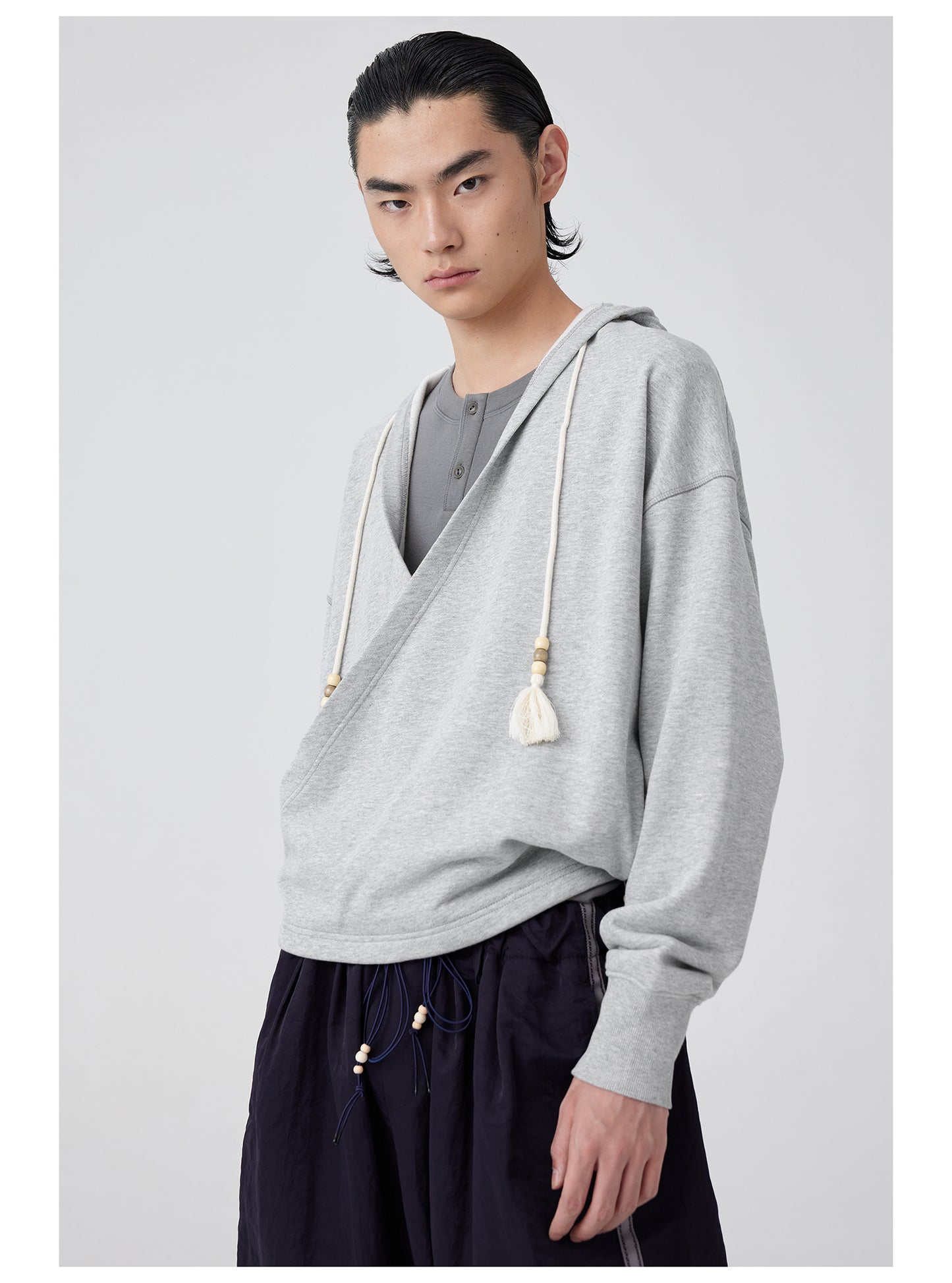 Overlap slant placket hooded sweatshirt