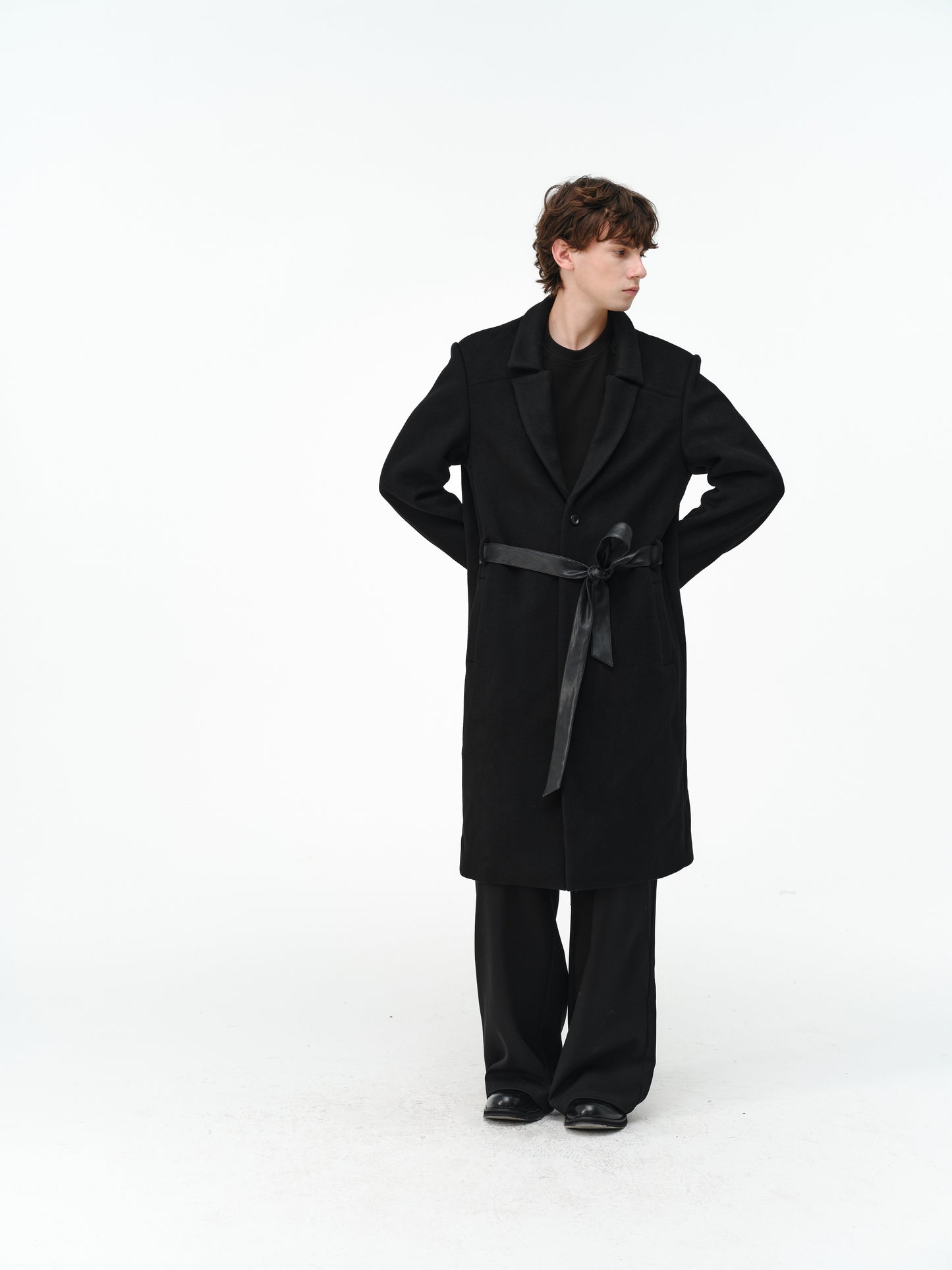 Overcoat with a leather belt