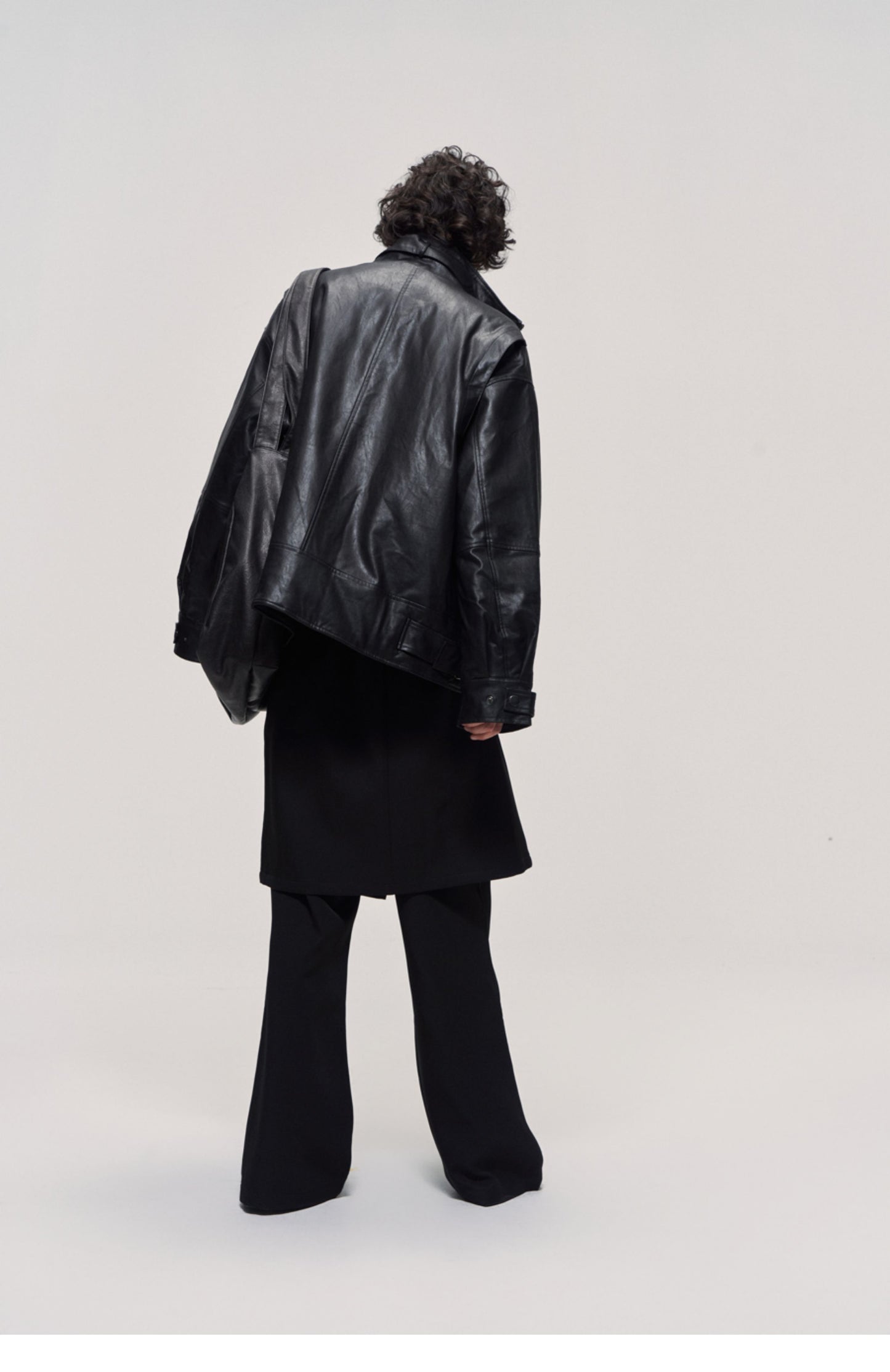 Damaged mid-length leather jacket