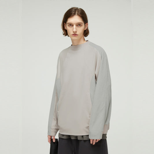 Knit fabric seamed sweatshirt