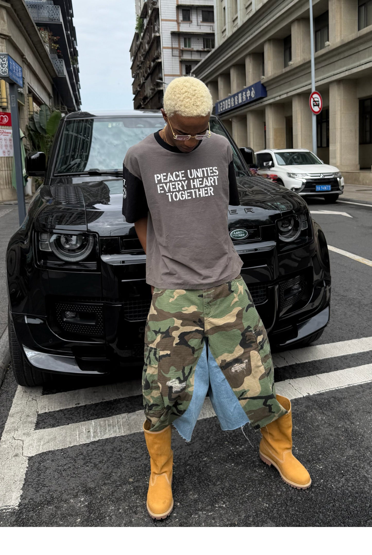 Camouflage-Print Distressed Patchwork Shorts