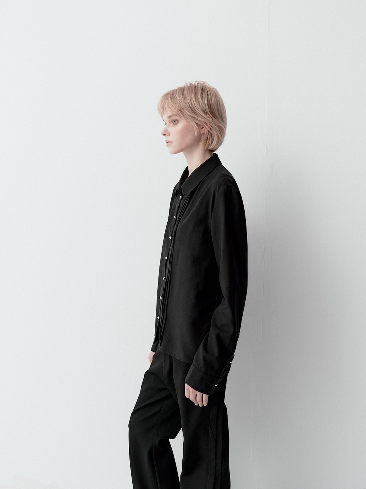 Shirt with metal buttons