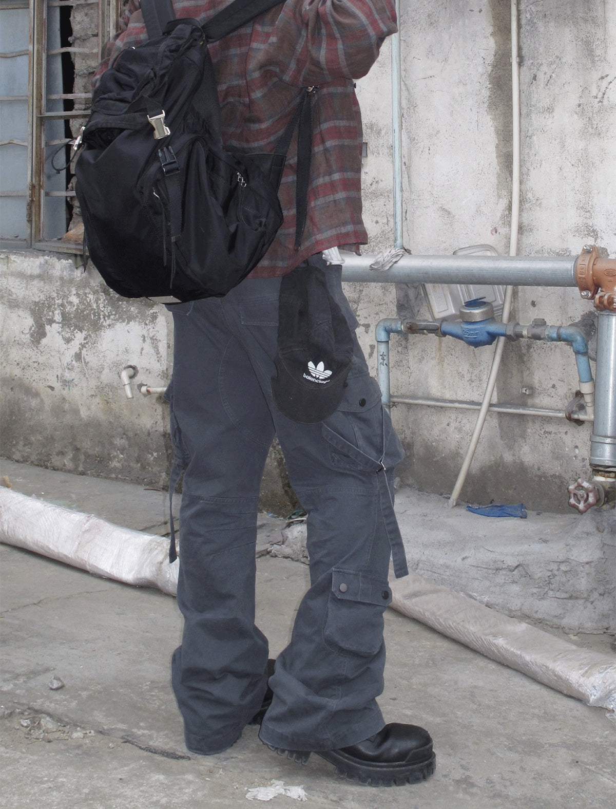 Cargo pants with multi-pocket straps