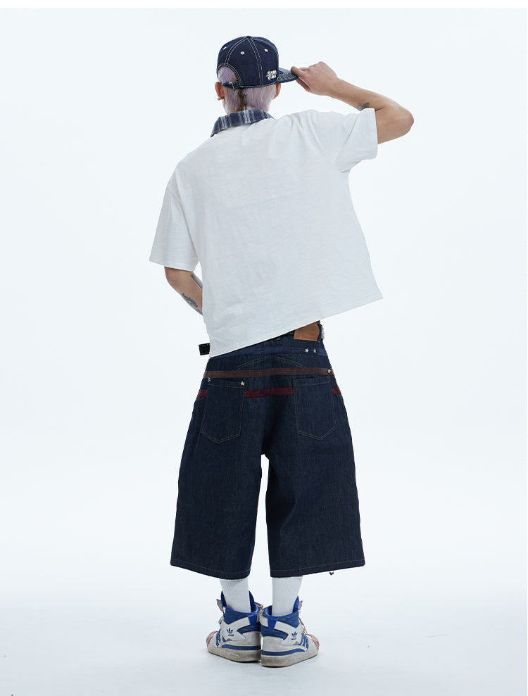 Original design studded denim shorts