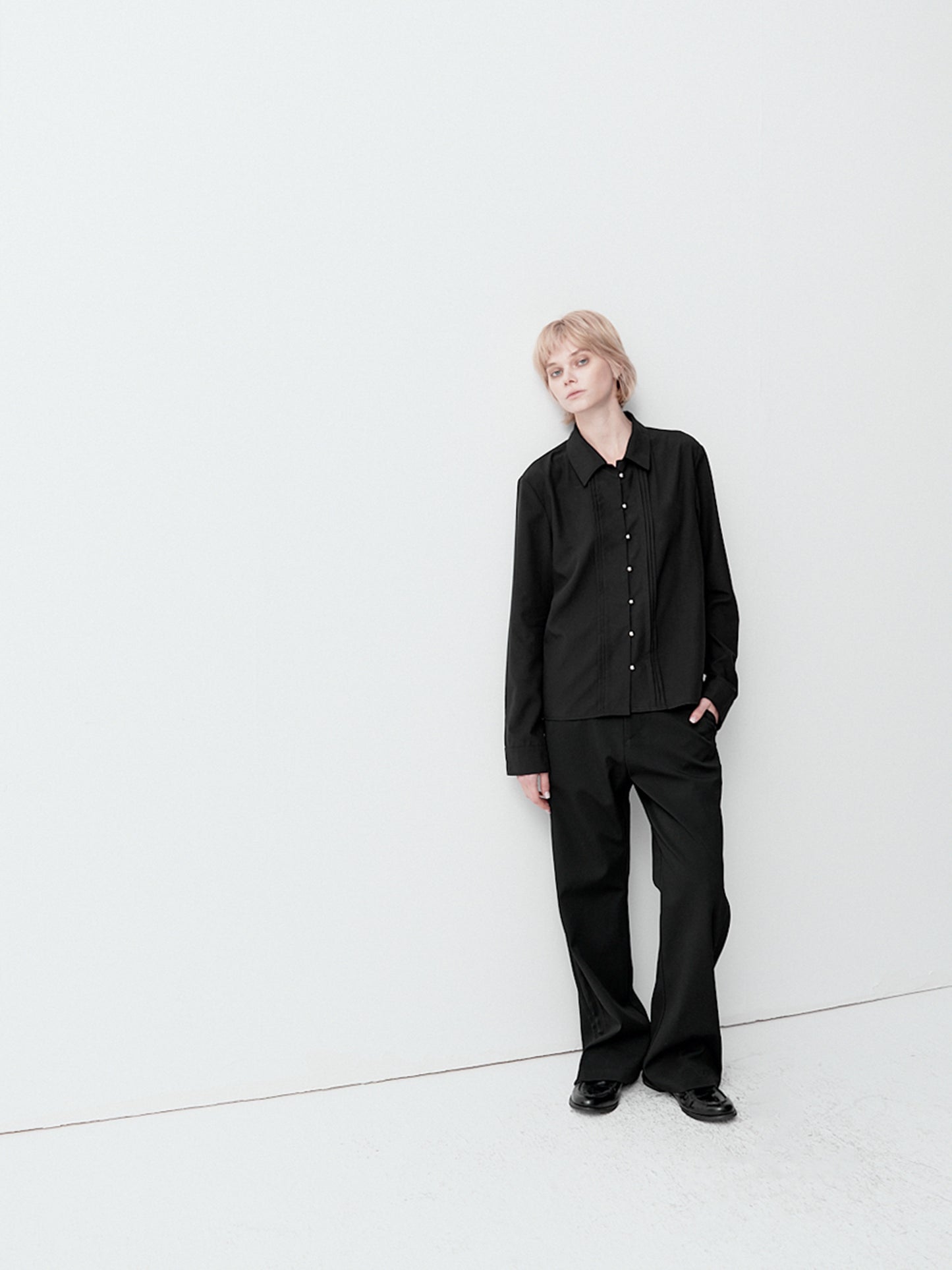 Shirt with metal buttons