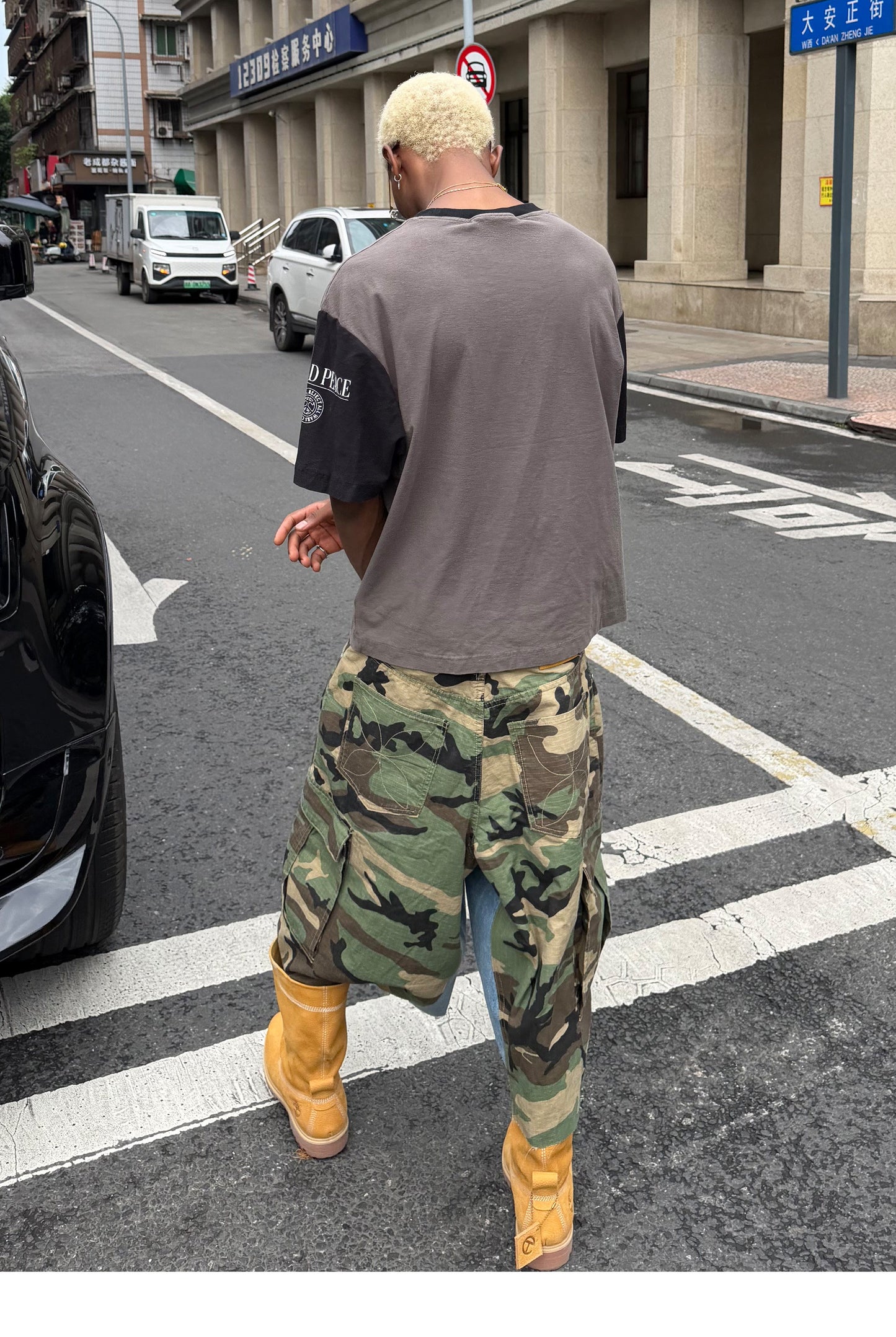 Camouflage-Print Distressed Patchwork Shorts