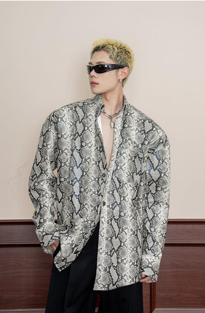 Snakeskin patterned shirt with shoulder pads