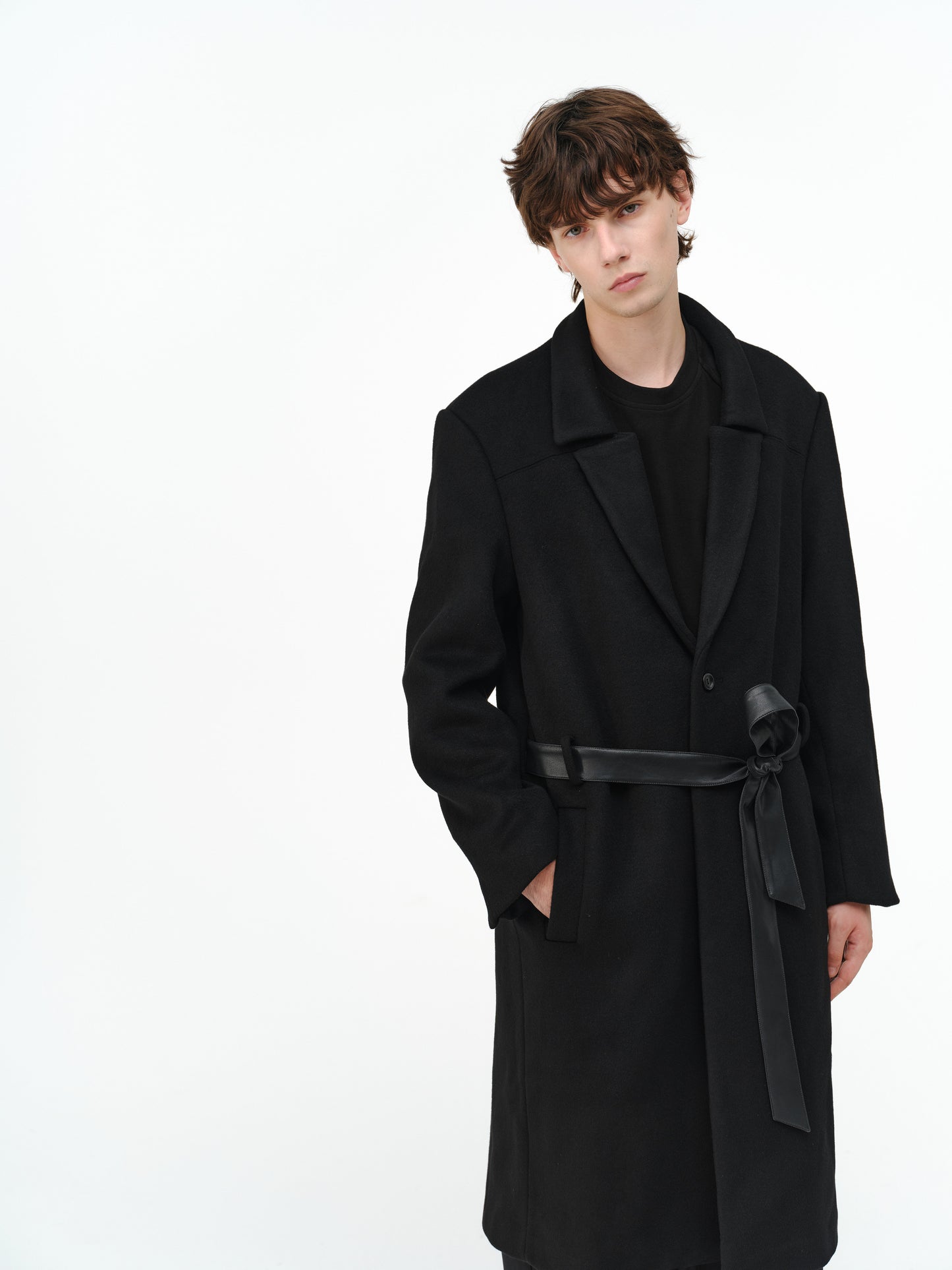 Overcoat with a leather belt