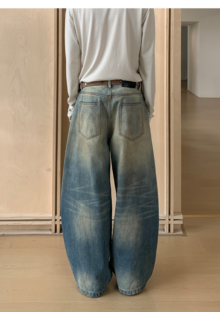 Mud-dyed wide-leg jeans