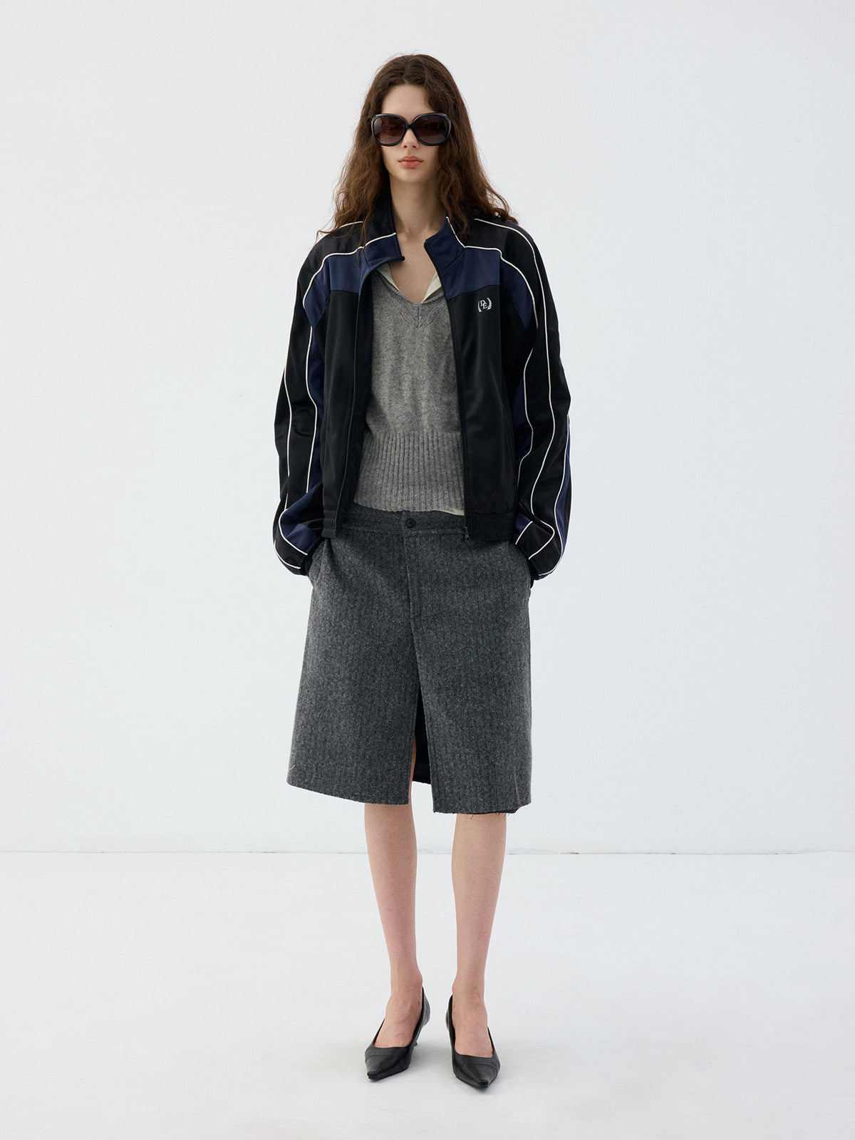 Jacket with a stand-up collar and a zipper