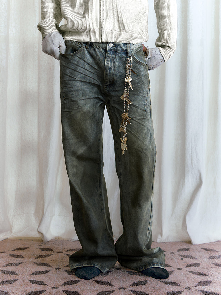 Oil stained jeans with three-dimensional beard