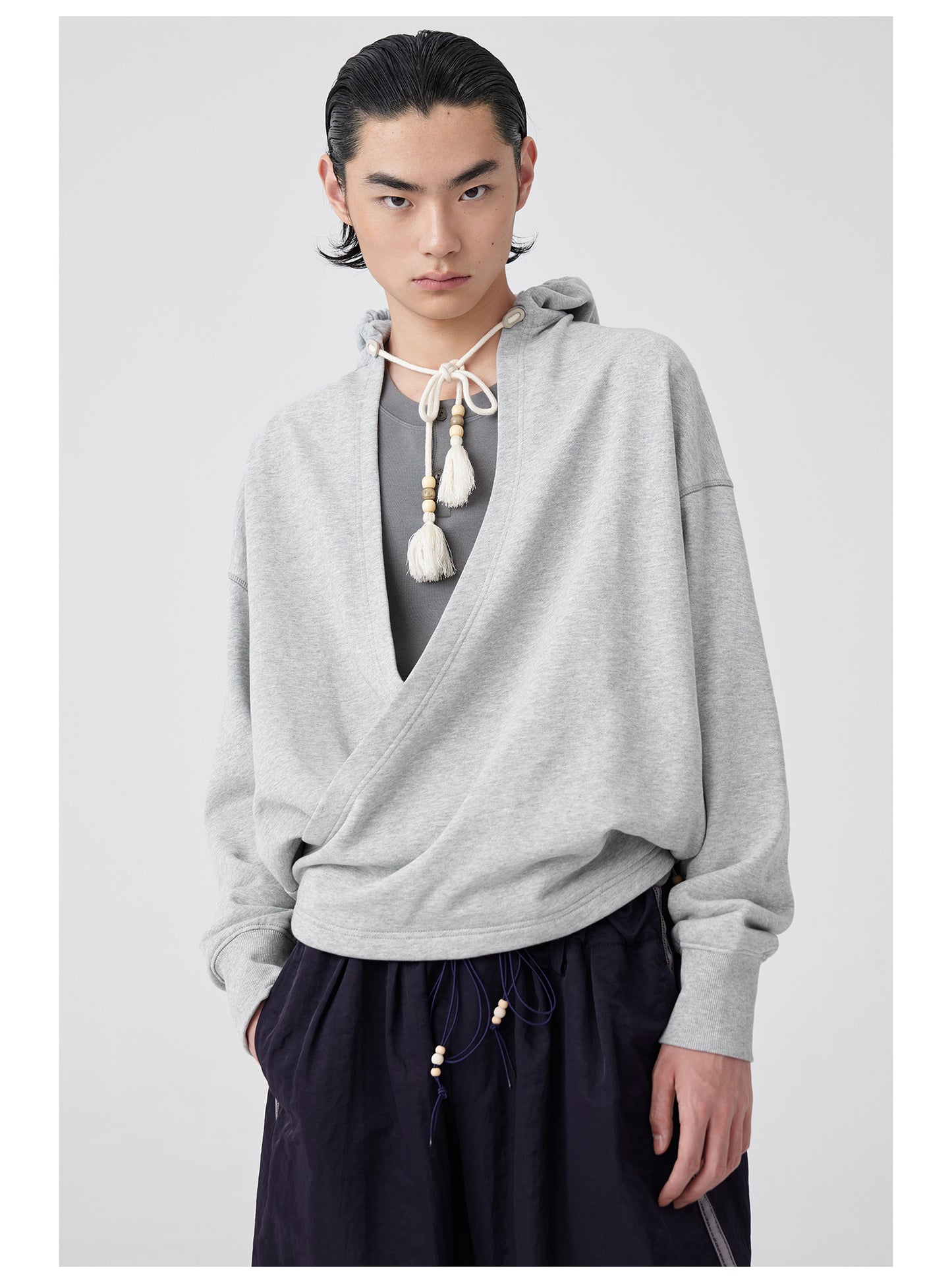 Overlap slant placket hooded sweatshirt