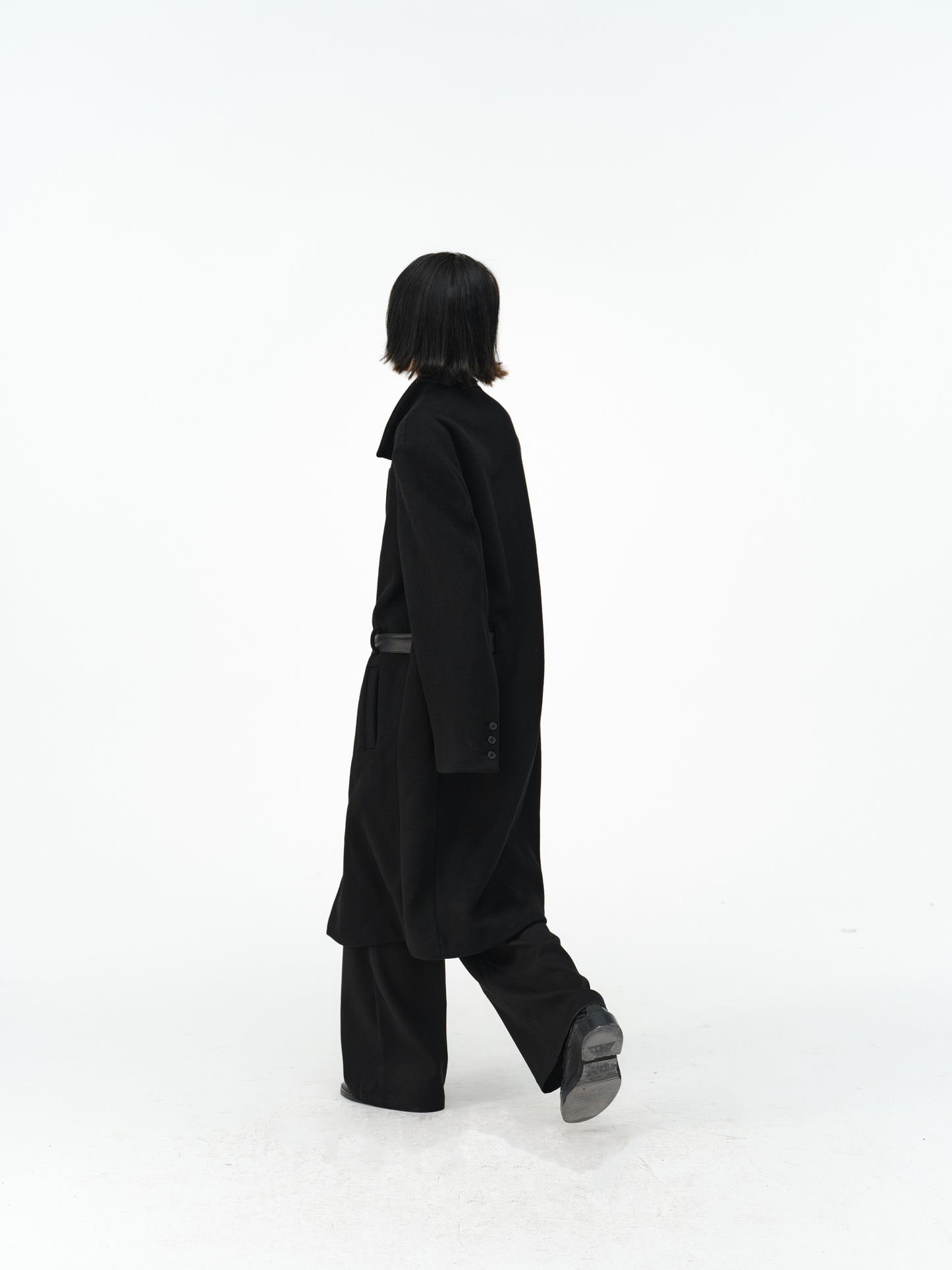 Overcoat with a leather belt