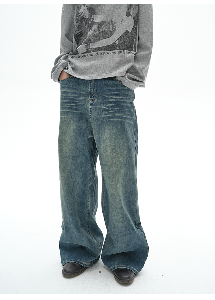 Washed damaged denim pants