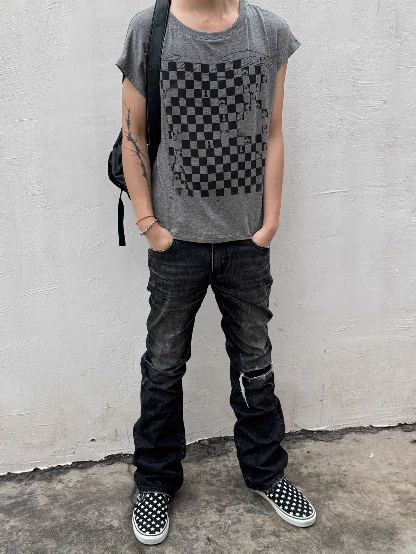 Vintage-style distressed denim pants
