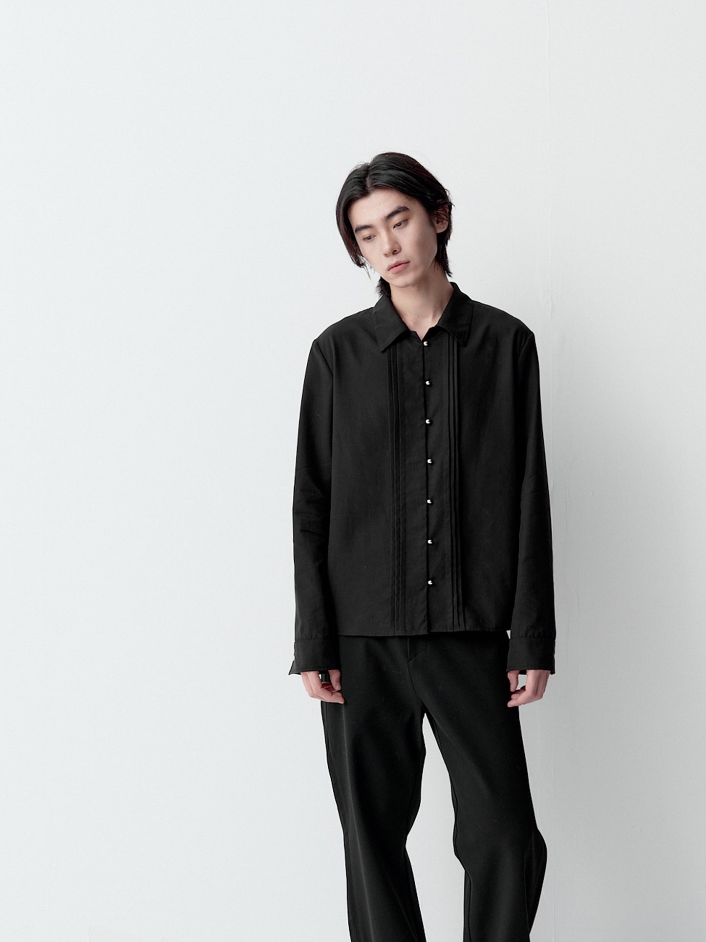 Shirt with metal buttons