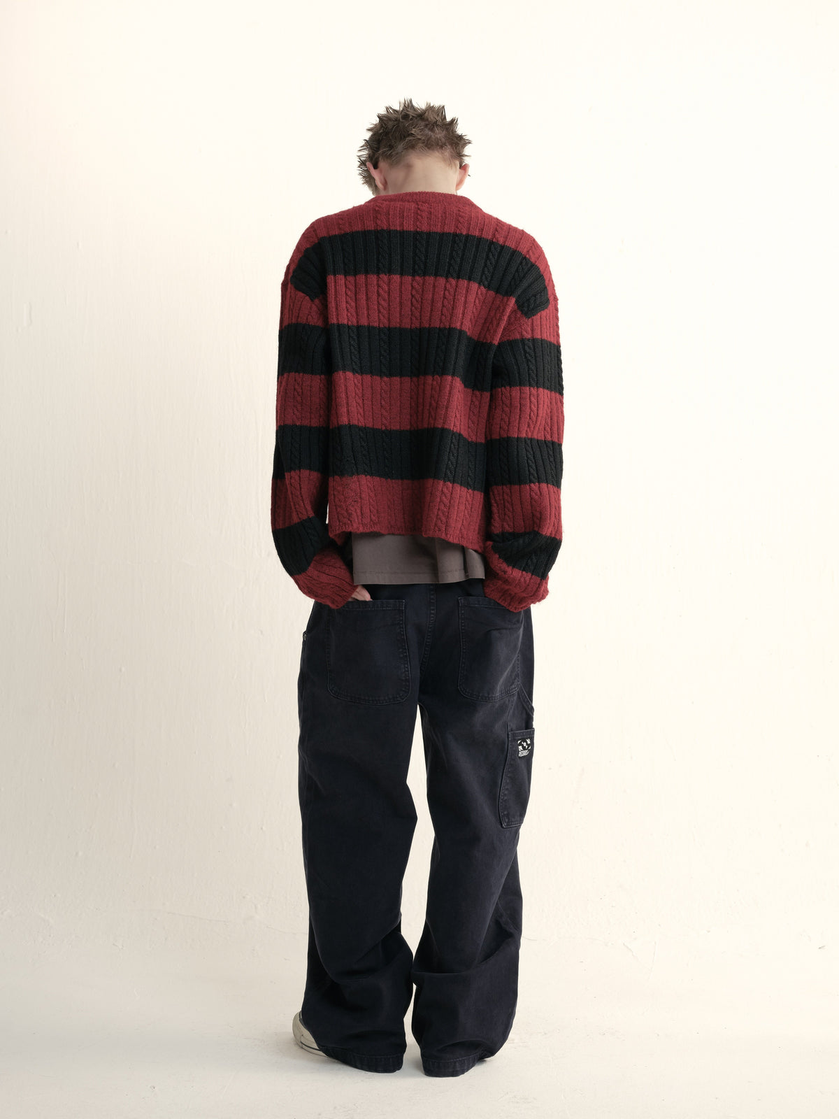 Cable wool striped distressed sweater