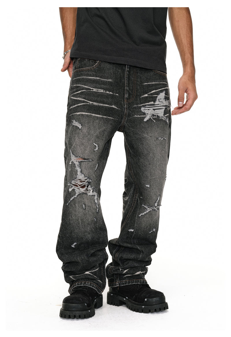 Distressed wash flare jeans