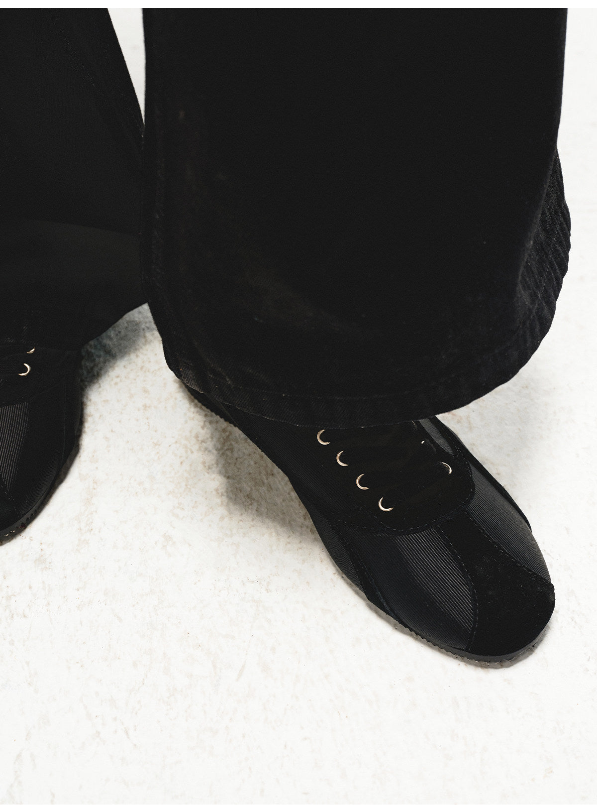 Shoes with a satin and suede combination design