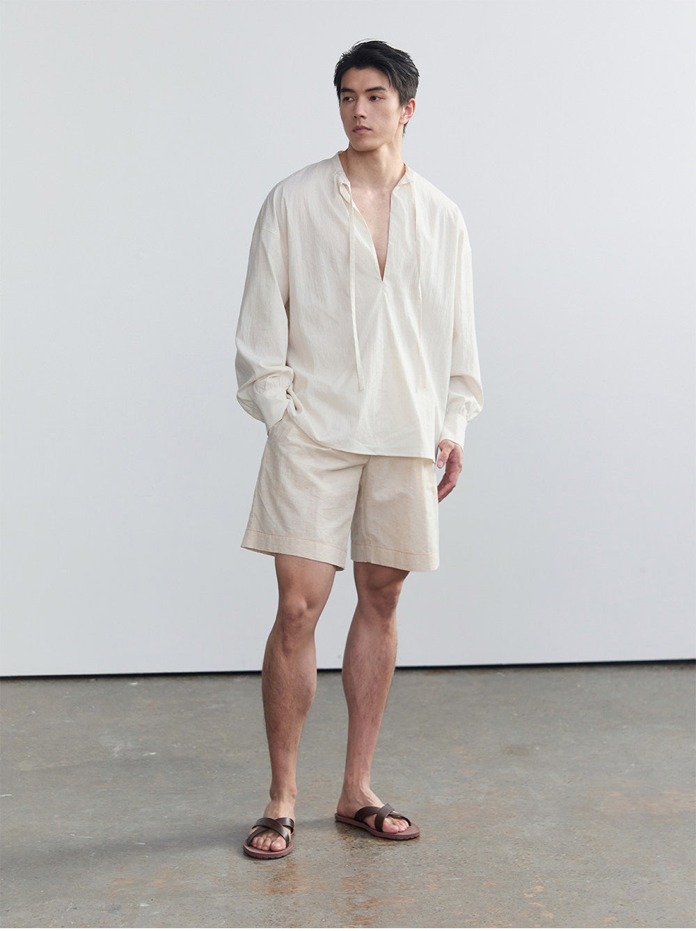 Half-open collar shirt with a ribbon