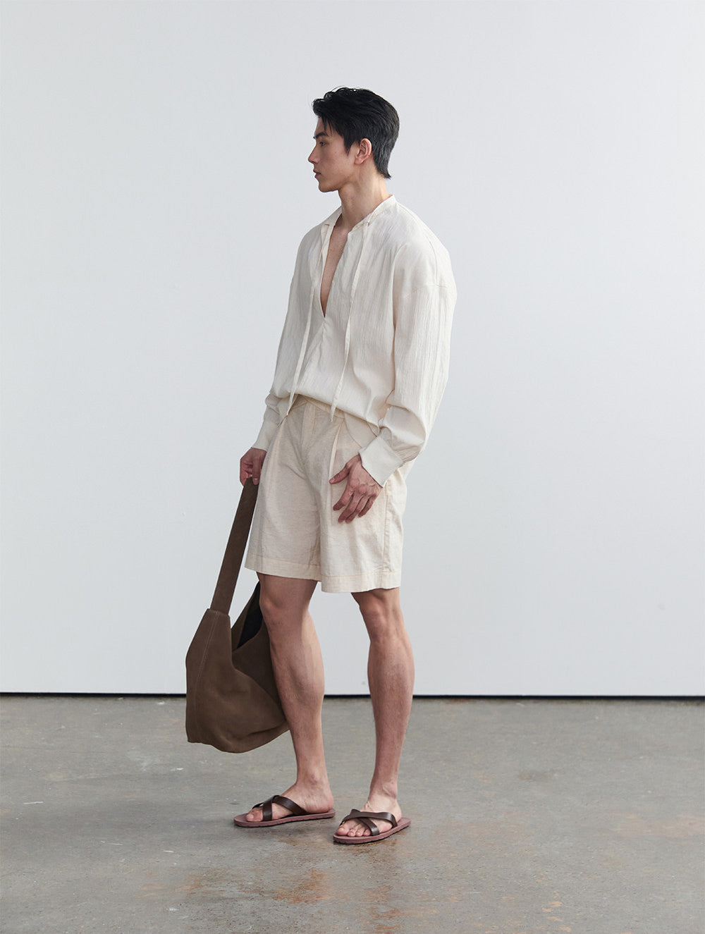 Half-open collar shirt with a ribbon