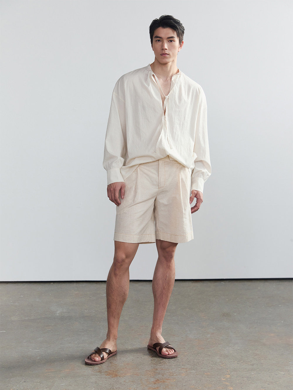 Half-open collar shirt with a ribbon