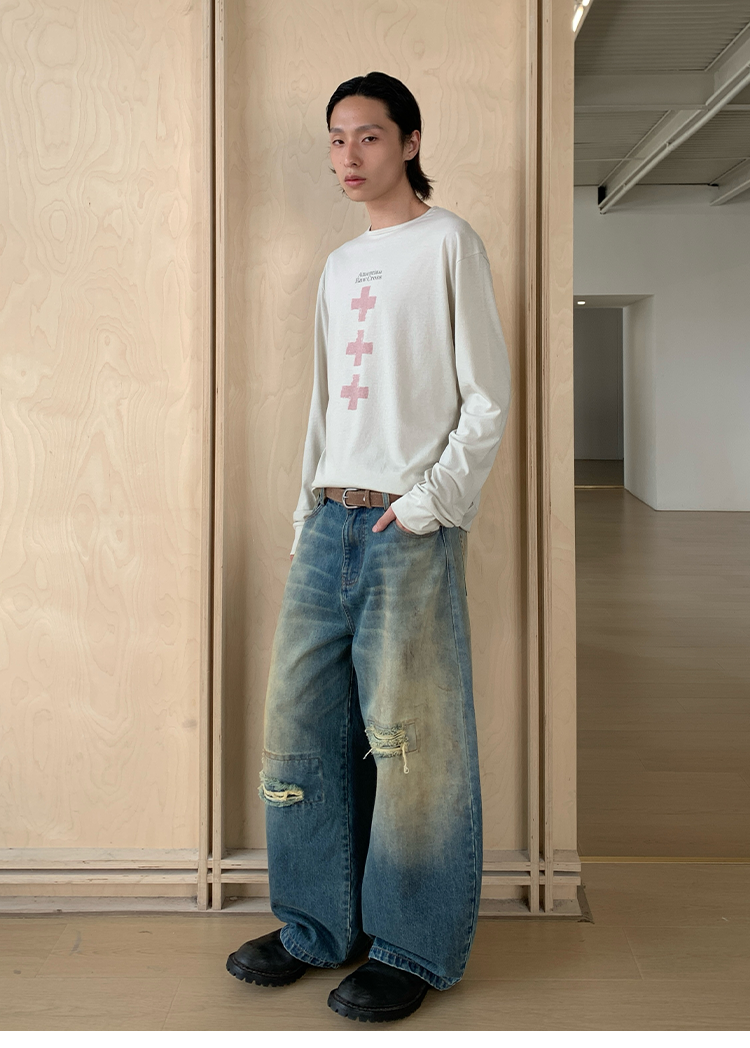 Mud-dyed wide-leg jeans