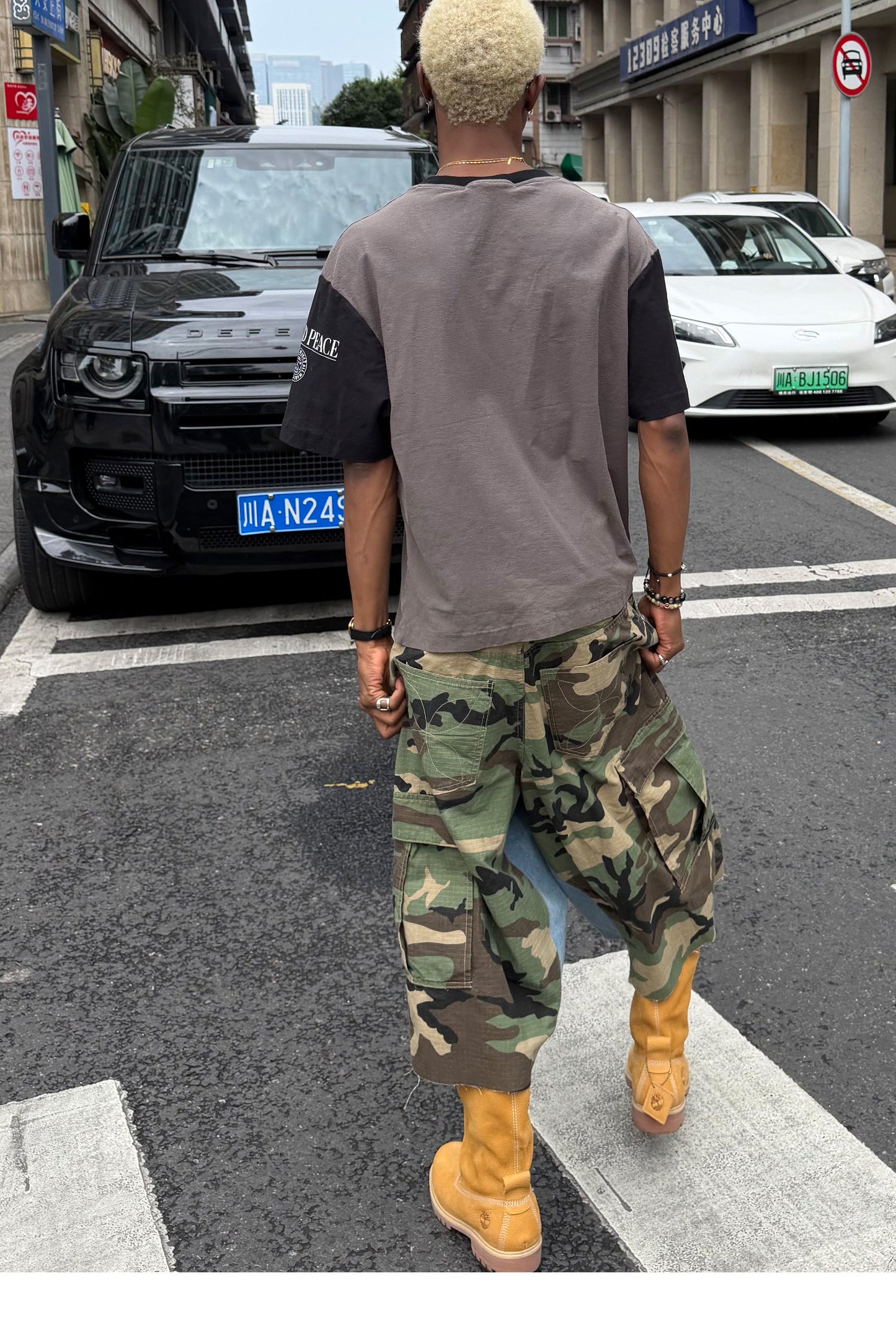Camouflage-Print Distressed Patchwork Shorts