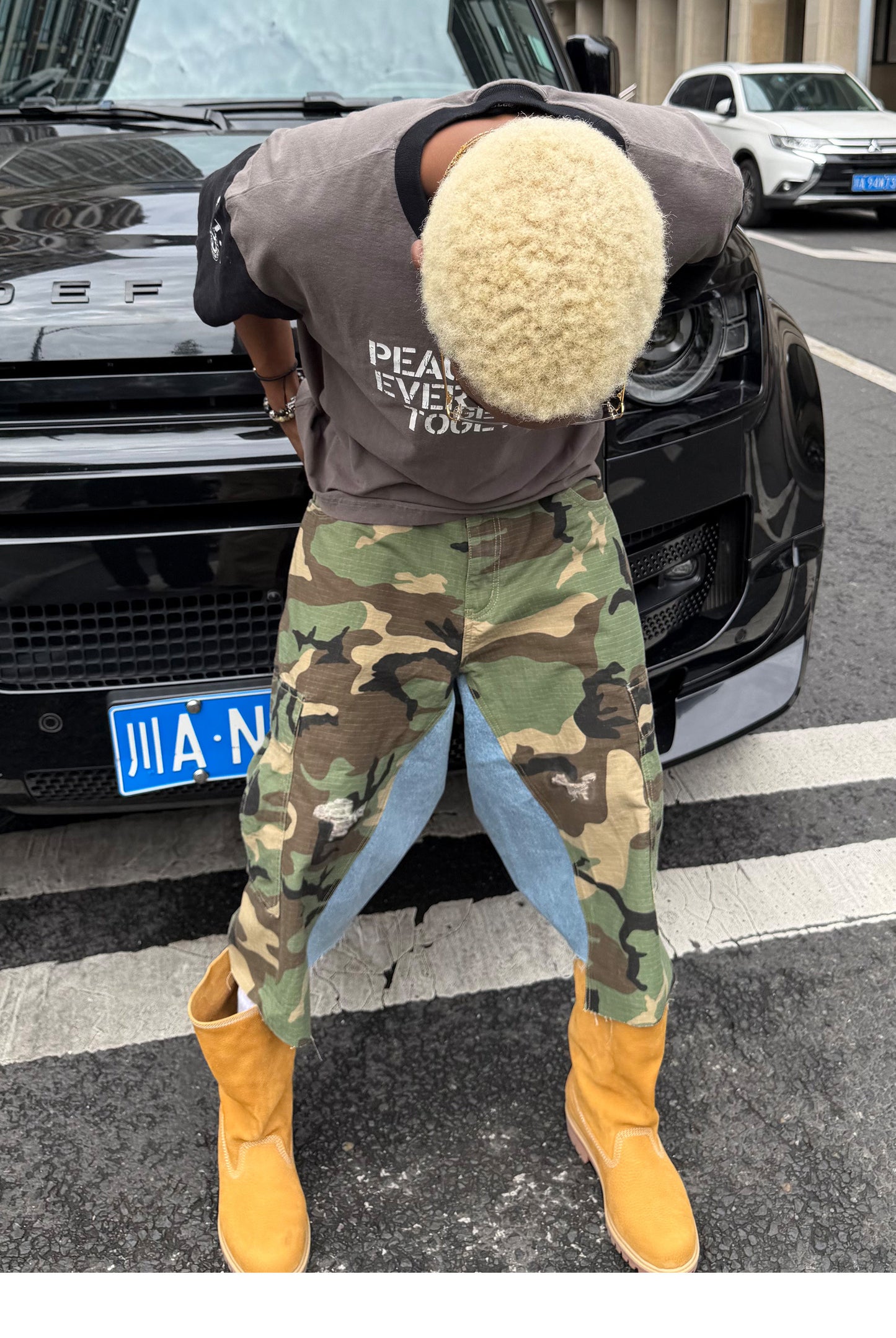 Camouflage-Print Distressed Patchwork Shorts