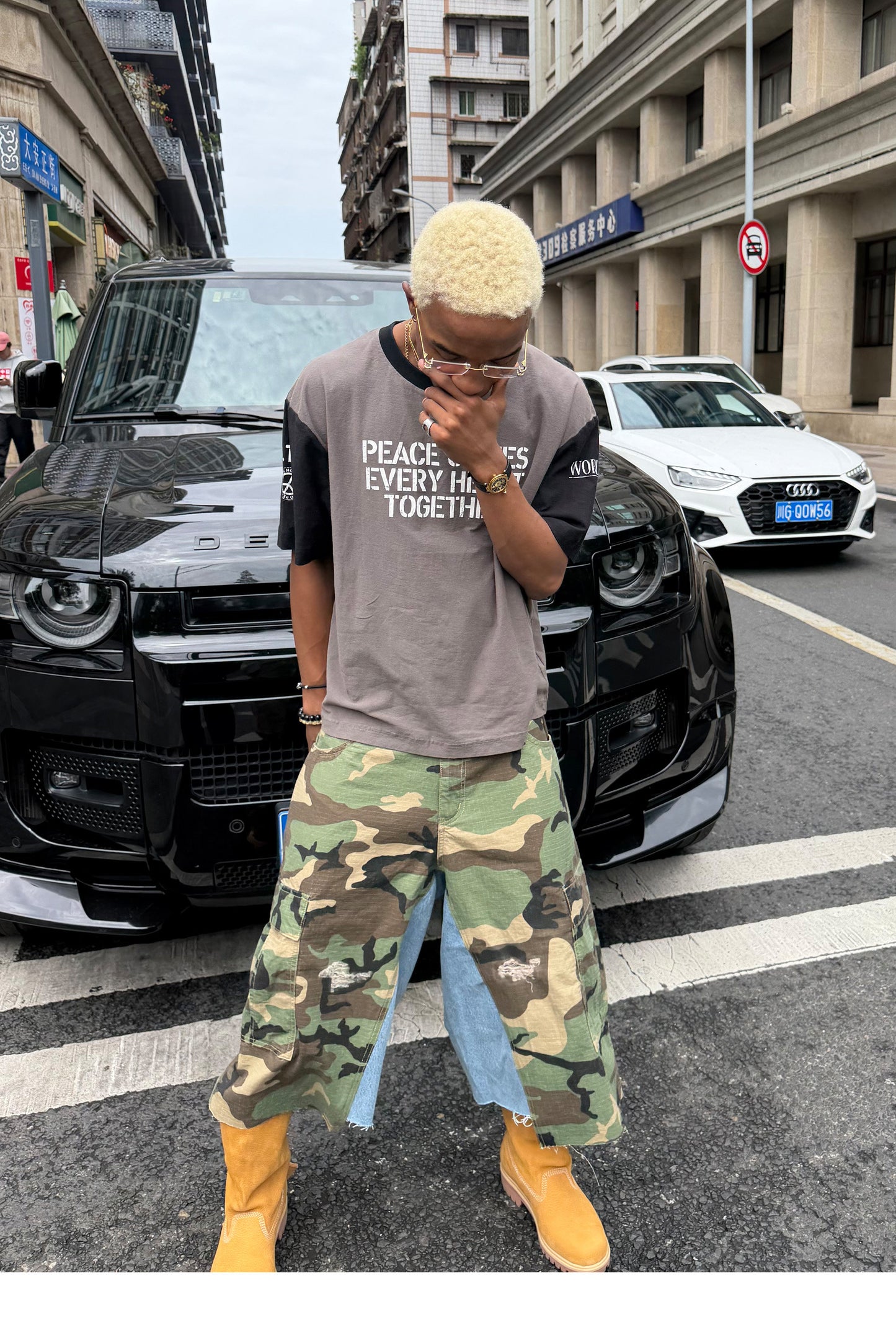 Camouflage-Print Distressed Patchwork Shorts