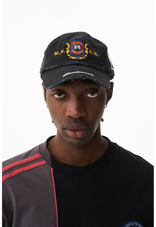 Wash-treated cap with embroidered patch