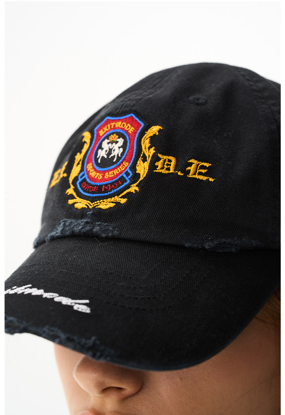 Wash-treated cap with embroidered patch