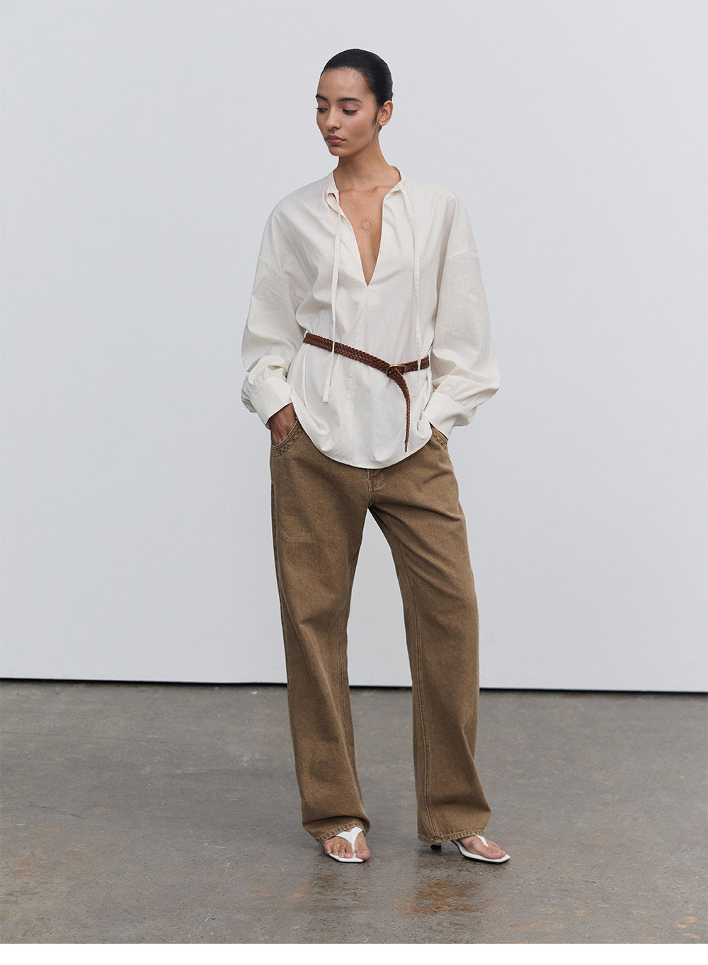 Half-open collar shirt with a ribbon