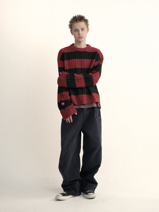 Cable knit wool striped distressed sweater