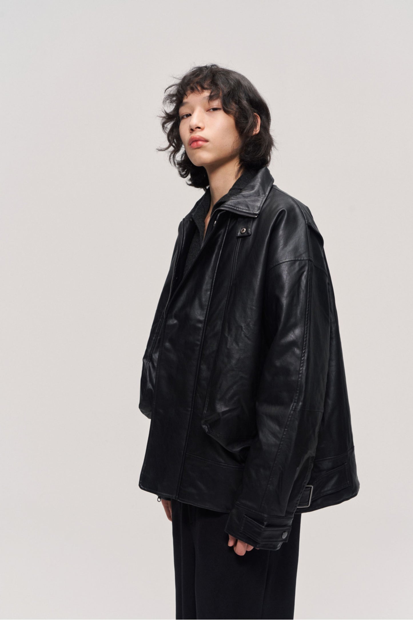 Damaged mid-length leather jacket