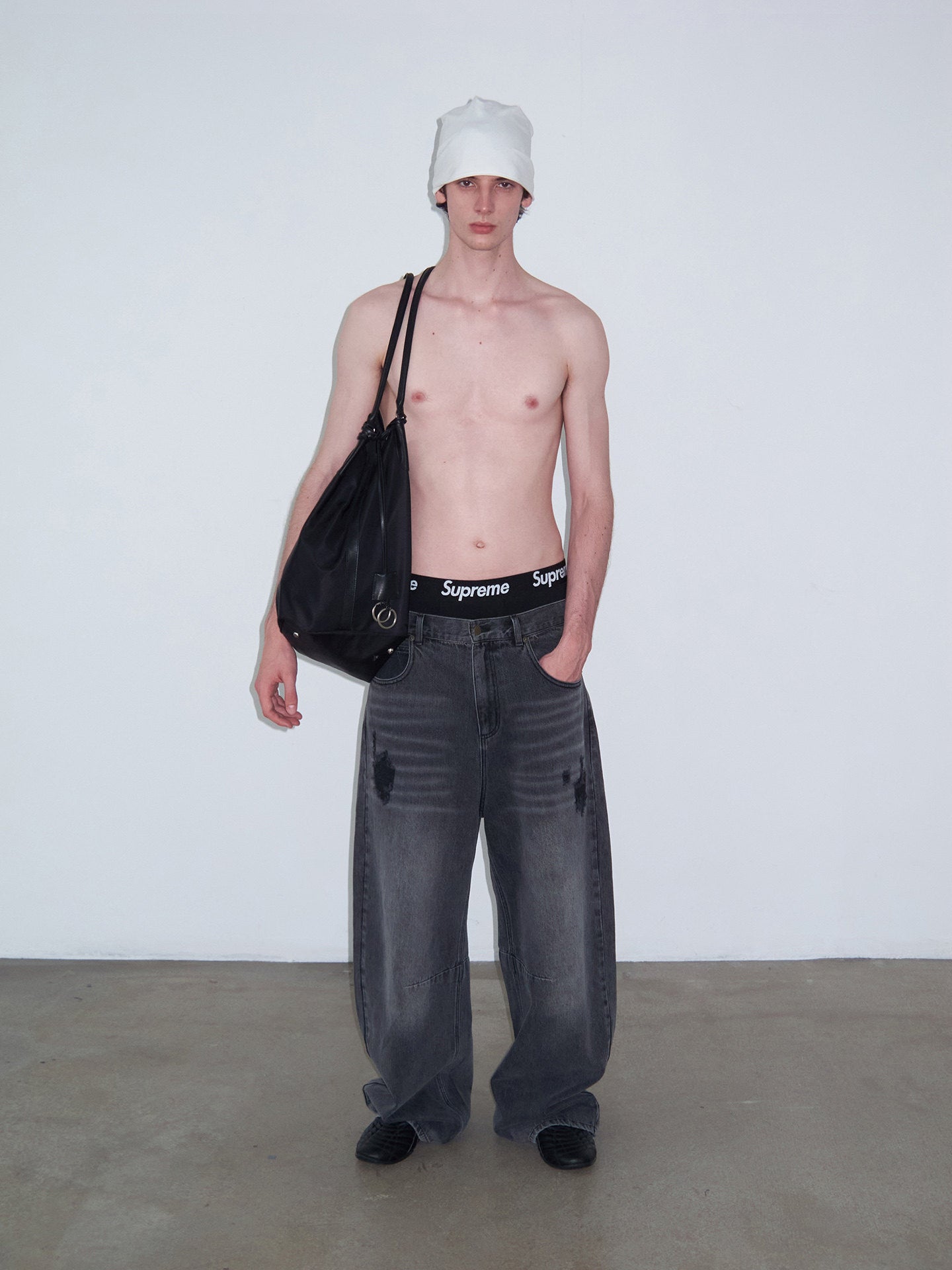 Distressed Patchwork Curved-Cut Denim Pants