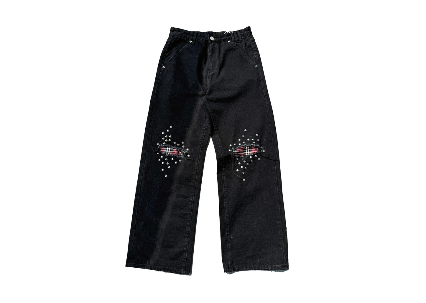 Jeans with distressed knee patches